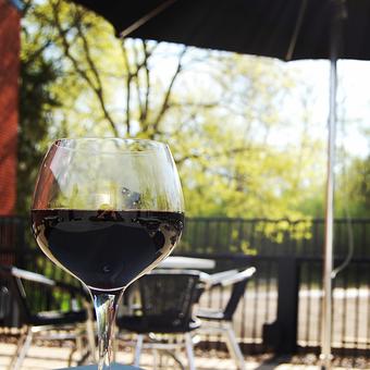 Product: Wine on the patio - Cedar Falls Brown Bottle in Cedar Falls, IA Italian Restaurants