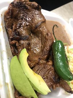 Product: Carne Asada Stake plate comes with rice and beans as well as tortillas and salsa - Charcoal Grill Chicken in Canyon Country, CA American Restaurants