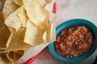 Product: Chips are fried in-house & served w/ Salsa Fresca, made in small batches w/ fresh tomatoes, serrano peppers, and onions - Chuy's in Sugar Land, TX Restaurants/Food & Dining