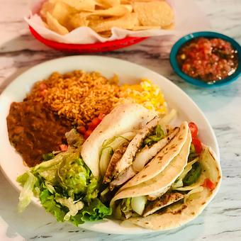 Product: Fajita beef or chicken with grilled onions & green chiles in flour tortillas - Chuy's in Madeira, OH Tex Mex Restaurants