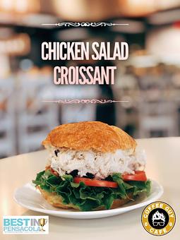Product: Our from scratch chicken salad croissants are made daily. The chicken salad is roasted in house and prepared with our own "Coffee Guy Secret Recipe." Served all day! - Coffee Guy Cafe in Pensacola, FL Coffee, Espresso & Tea House Restaurants