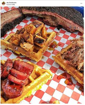 Product: Two of our delicious sweet and spicy cornbread waffles with your choice of 3 meats drizzled with cane syrup. Yummy! - Courson’s BBQ in Austin, TX Barbecue Restaurants