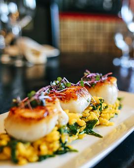 Product: Our special - Scallops with saffron risotto - Cravings Tapas Bistro in Ridgewood, NJ Tapas Bars