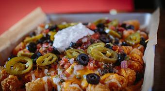 Product: Tachos are like tater tots on steroids, except with all the best stuff. - Crazy Horse Saloon & Grill in Nevada City, CA American Restaurants