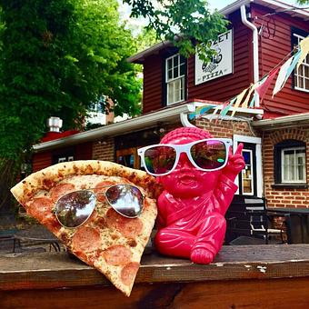 Product - Crozet Pizza at Buddhist Biker Bar in Charlottesville, VA Bars & Grills