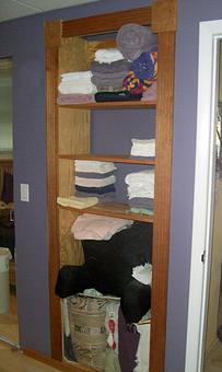Product: Custom Built-In Linen Cubby - D'anca Design in Westchester, IL Graphic Design Services