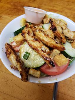 Product: teriyaki chicken salad but you can get it in any wing flavor - Dabomb Sports Grill in Stonecrest area - Lithonia, GA American Restaurants