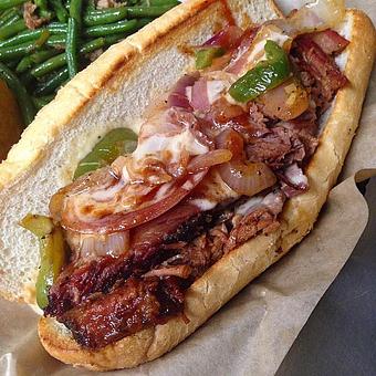 Product: Brisket Texas Philly and Green Beans sautéed with Smoked Pulled Pork - Deep Run Roadhouse in West End - Richmond, VA Barbecue Restaurants