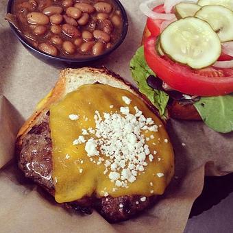 Product: House Burger topped w/ Lettuce, Tomato, Onion Pickle, American Cheese and Queso Fresco - Deep Run Roadhouse in West End - Richmond, VA Barbecue Restaurants