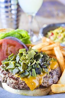 Product: The Del Charro Burger with Green Chile and Cheddar Cheese - Del Charro Saloon in Downtown Santa Fe - Santa Fe, NM American Restaurants