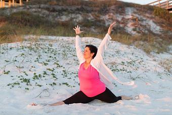 Product: Michele in splits - Destin Hot Yoga in Across the street from the Sandestin Outlet Mall - Miramar Beach, FL Yoga Instruction