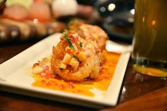 Product: coconut fried prawns with a pineapple-chili salsa, cilantro sesame oil - Divani in Grand Rapids, MI American Restaurants