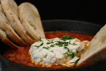 Product: baked gorgonzola & goat cheese, spicy pomodoro served with toasted crostini - Divani in Grand Rapids, MI American Restaurants
