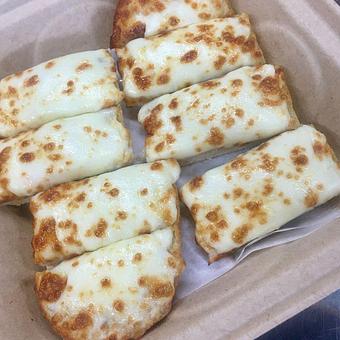 Product: Garlic cheese bread on our homemade hoagie rolls - Dom Bakeries North Carolina in North Wilkesboro, NC Bakeries