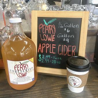 Product: Local cider from our neighbors at Perry Lowe Orchards! Available by the glass/cup, gallon jug, or 1/2 gallon jug. - Dom Bakeries North Carolina in North Wilkesboro, NC Bakeries