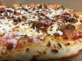 Product: Caveman - Pepperoni, Sausage, Canadian Bacon, and Bacon - Doughboys Pizza in Fort Worth, TX Italian Restaurants
