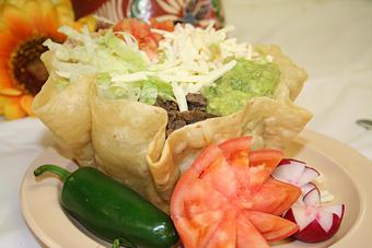 Product: Taco salad served with choice of meat. - El Torito Restaurant & Meat Market in Hesperia, CA Mexican Restaurants