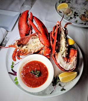 Product: served with lemon wedges and marinara sauce - Empire Steak House in New York, NY Seafood Restaurants