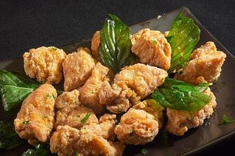 Product: Delicious fried chicken nuggets with basil leaves - Eurasian Bistro in Argonaut Village - Pensacola, FL Vietnamese Restaurants