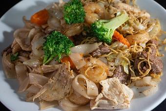 Product: Rice noodles or egg noodles stir-fry with vegetables and your choice of protein (Beef, Chicken, or Shrimp). - Eurasian Bistro in Argonaut Village - Pensacola, FL Vietnamese Restaurants
