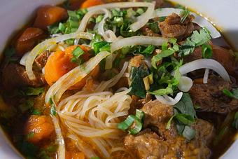 Product: Vietnamese beef stew over rice noodles - Eurasian Bistro in Argonaut Village - Pensacola, FL Vietnamese Restaurants
