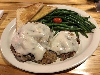 Product: Hand battered chicken fried steak - Evil Olive in San Antonio, TX Bars & Grills