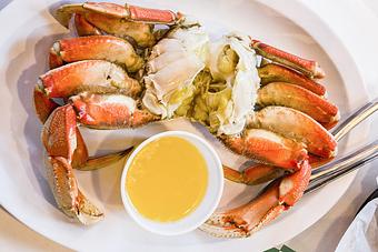 Product: Featured on Diners, Drive-Ins and Dives! A whole FRESH Oregon Dungeness crab steamed with lemon & butter. Served with your choice of Criss-cut fries & Coleslaw or Soup & Salad! - Fisherman's Market in Whiteaker - Eugene, OR Seafood Restaurants