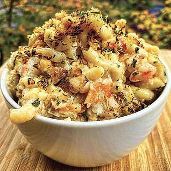 Product: A comforting classic made with delicious crab meat and house-smoked cheese. Suggested serving shown. - Fisherman's Market in Whiteaker - Eugene, OR Seafood Restaurants