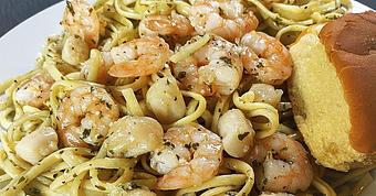 Product: Linguine with garlic, olive oil, butter and wine sauce. Cooked to order and served with parmesan cheese and a dinner roll. Add Bay Scallops +$1 - Fisherman's Market in Whiteaker - Eugene, OR Seafood Restaurants