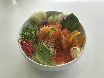 Product: Spicy Salmon, Avocado, Yamagobo, Cucumber Red Radish, Green Onions, Uzura, bonito flakes and spicy Ponsu sauce - Flamin' Phó & Sushi Bar in San Diego, CA Sushi Restaurants