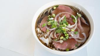 Product: A unique combination for meat lovers: slices of rare steak, well-done brisket, flanks & Tripe. - Flamin' Phó & Sushi Bar in San Diego, CA Sushi Restaurants