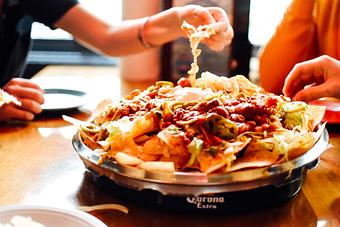 Product: Try our popular fiesta nachos! Ole! - Geddy's in Downtown Bar Harbor, just steps from the town pier. - Bar Harbor, ME American Restaurants