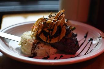 Product: Meat lovers rejoice with this local favorite. - Geddy's in Downtown Bar Harbor, just steps from the town pier. - Bar Harbor, ME American Restaurants