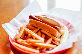 Product: It doesn't get better than a Hot Dog and Frisbee for Kids! - Geddy's in Downtown Bar Harbor, just steps from the town pier. - Bar Harbor, ME American Restaurants