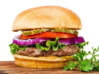 Product: Infused with onions, garlic, parsley and other herbs and spices. - Gimme A Burger in Deerfield Beach - Deerfield Beach, FL Hamburger Restaurants