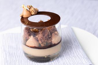 Product: Stein's version of an upscale German chocolate cake in a glass - Glitretind Restaurant in Deer Valley - Park City, UT American Restaurants