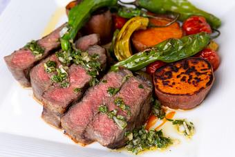 Product: Cooked to perfection with a colorful side of veggies - Glitretind Restaurant in Deer Valley - Park City, UT American Restaurants