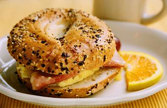 Product: Who wouldn't love a warm fresh toasted bagel with egg and cheese to start their day - Goose Feathers Cafe & Bakery in Ellis Square District, Downtown - Savannah, GA American Restaurants