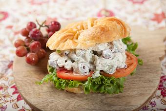 Product: A pairing of two great items, a warm homemade croissant and wonderful fresh made southern chicken salad. - Goose Feathers Cafe & Bakery in Ellis Square District, Downtown - Savannah, GA American Restaurants