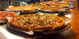 Product: Enjoy our fresh, hot pizza and pasta buffet every day at lunch! - Gucci's Pizza - Adt Alarm - Adt Security - Customer Service in Marshall, TX Italian Restaurants