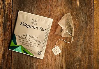 Product: An organic China green tea with savory, nutty flavors in an amply sized pyramid  bag to ensure that the flavors end up in the cup, not tossed out with the bag. - Harold's Coffee Lounge in Northwood - West Palm Beach, FL Coffee, Espresso & Tea House Restaurants