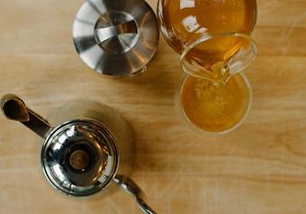 Product: Jasmine Green is a traditional blend of spring-picked green tea scented with fresh aromatic jasmine blossoms. - Harold's Coffee Lounge in Northwood - West Palm Beach, FL Coffee, Espresso & Tea House Restaurants