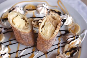 Product: Banana Caramel Cheesecake Xango Island Style - Hemingway's at the Coral Reef in Ocean City, Maryland. Downtown. - Ocean City, MD American Restaurants