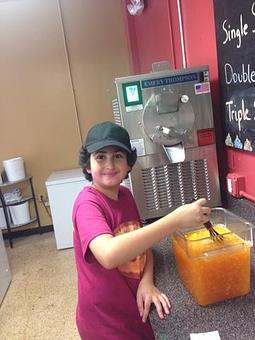 Product: The youngest Torres learning the trade - Here's The Scoop Homemade Ice Cream and Italian Ices in Melbourne, FL Dessert Restaurants