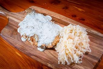 Product: Pork Schnitzel with White Dill Sauce - Hermann Wurst Haus in Historic Downtown Hermann - Hermann, MO Delicatessen Restaurants