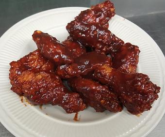 Product: Bone in and covered in BBQ. - Hickory Lodge Bar & Grill in Worthington, MN Bars & Grills