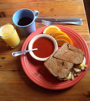 Product: Breakfast Sandwich with a side of red chile sauce - local favorite. - Hillsboro General Store in Hillsboro New Mexico Historical District - Hillsboro, NM American Restaurants