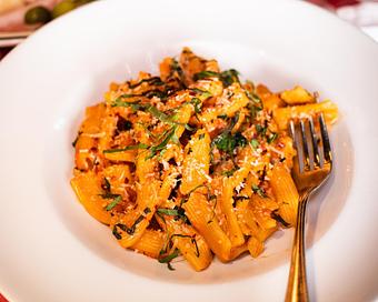 Product: a guest favorite! imported rigatoni served with a creamy vodka sauce. pro tip: add your choice of protein - Il Porcellino in River North - Chicago, IL Italian Restaurants
