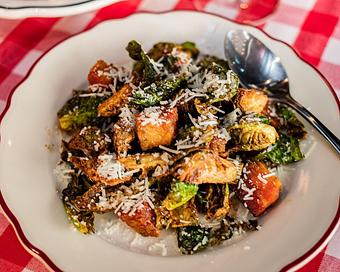 Product: crispy brussels sprouts quartered and tossed with aged balsamic and crispy bacon. finished with pecorino cheese - Il Porcellino in River North - Chicago, IL Italian Restaurants