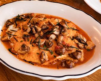 Product: chicken breast dredged in seasoned flour and sauteed with mushrooms, rosemary, and a velvety marsala sauce. served with roasted potato wedges - Il Porcellino in River North - Chicago, IL Italian Restaurants